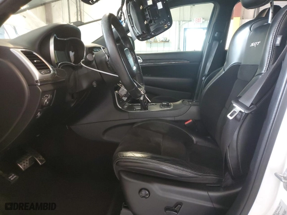 2015 Jeep Grand Cherokee SRT with VIN 1C4RJFDJ9FC237930, listed as a Copart auction lot 63540384 with 126,606 mi miles and Salvage Title. Bid and sale history available at carsss.com. Image 7.