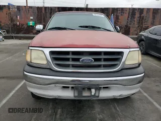 2001 Ford F-150 XLT with VIN 1FTRW07WX1KE51166, listed as a Copart auction lot 60164025 with 157,035 mi miles and Salvage title. Bid and sale history available at DreamBid. Image 5.