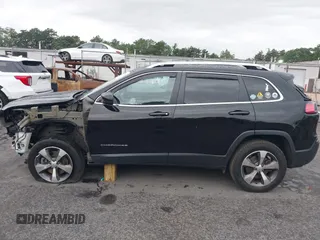 2021 Jeep Cherokee Limited z VIN 1C4PJMDX8MD121545, wystawiony jako IAAI lot #42706490 z przebiegiem 154 382 mil mil oraz . Historia ofert i sprzedaży dostępna na DreamBid. Obrazek 15.