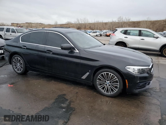2018 BMW 5 Series 530e xDrive with VIN WBAJB1C5XJB084018, listed as a Copart auction lot 86277124 with 127,517 mi miles and Salvage Title. Bid and sale history available at carsss.com. Image 4.