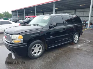 2005 GMC Yukon Denali z VIN 1GKEK63U95J112545, wystawiony jako IAAI lot #42396941 z przebiegiem 288 670 mil mil oraz . Historia ofert i sprzedaży dostępna na DreamBid. Obrazek 2.