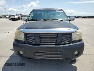 2006 Nissan Titan SE z VIN 1N6BA06A66N569501, wystawiony jako Copart lot #59872455 z przebiegiem 80 057 mil mil oraz Szkoda całkowita • Salvage title. Historia ofert i sprzedaży dostępna na DreamBid. Obrazek 5.