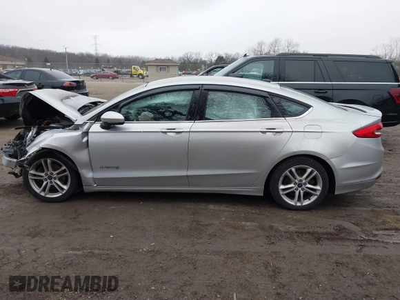 2018 Ford Fusion SE z VIN 3FA6P0LU3JR141401, wystawiony jako IAAI lot #41718444 z przebiegiem Nie podano mil oraz . Historia ofert i sprzedaży dostępna na DreamBid. Obrazek 15.
