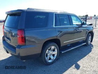 2017 Chevrolet Tahoe LT with VIN 1GNSCBKC1HR403647, listed as a IAAI auction lot 42237667 with 90,969 mi miles and . Bid and sale history available at DreamBid. Image 4.