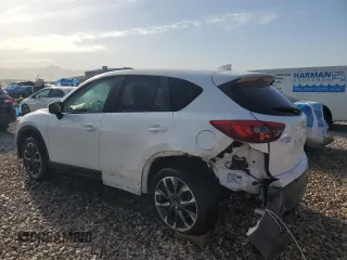 2016 Mazda CX-5 Grand Touring with VIN JM3KE4DY3G0688286, listed as a Copart auction lot 52182205 with 194,352 mi miles and Salvage Title. Bid and sale history available at DreamBid. Image 2.