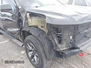 2022 Chevrolet Suburban z VIN 1GNSKDKL5NR218592, wystawiony jako IAAI lot #41989302 z przebiegiem 184 080 mil mil oraz . Historia ofert i sprzedaży dostępna na DreamBid. Obrazek 6.