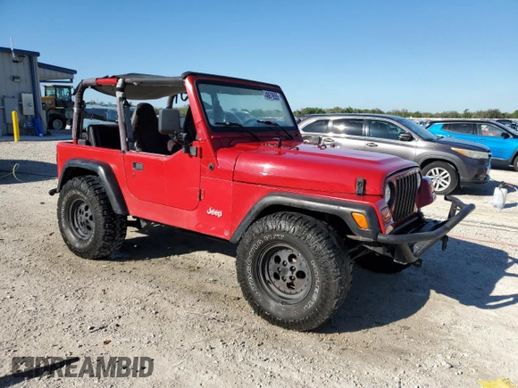 1999 Jeep Wrangler SE with VIN 1J4FY29P8XP483909, listed as a Copart auction lot 48679555 with 168,708 mi miles and Salvage title. Bid and sale history available at DreamBid. Image 4.