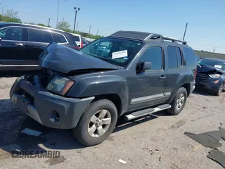 2012 Nissan Xterra X with VIN 5N1AN0NU8CC523668, listed as a IAAI auction lot 41821919 with 243,035 mi miles and . Bid and sale history available at DreamBid. Image 2.