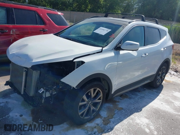 2017 Hyundai Santa Fe Ultimate with VIN 5XYZWDLA9HG481809, listed as a IAAI auction lot 42494779 with 69,674 mi miles and . Bid and sale history available at DreamBid. Image 2.