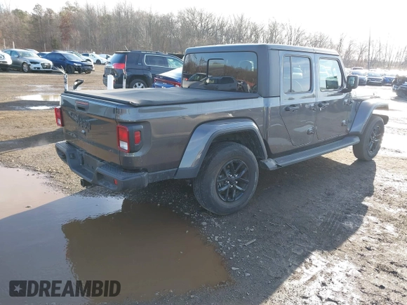 2022 Jeep Gladiator Texas Trail with VIN 1C6HJTAG7NL141819, listed as a IAAI auction lot 41520083 with 21,191 mi miles and . Bid and sale history available at DreamBid. Image 4.