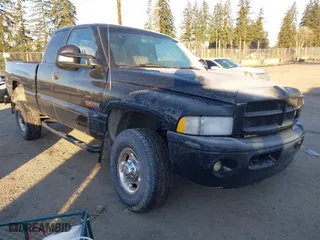 2002 Dodge Ram 2500 with VIN 3B7KF23652M210001, listed as a IAAI auction lot 41408050 with 298,112 mi miles. Bid and sale history available at carsss.com. Image 1.