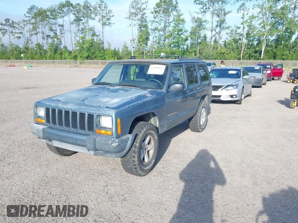 1999 Jeep Cherokee Sport with VIN 1J4FT68S9XL581835, listed as a IAAI auction lot 42499071 with 203,782 mi miles and . Bid and sale history available at DreamBid. Image 2.