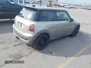 2009 MINI Hardtop S with VIN WMWMF73569TW87929, listed as a IAAI auction lot 42057214 with 164,922 mi miles and . Bid and sale history available at DreamBid. Image 4.