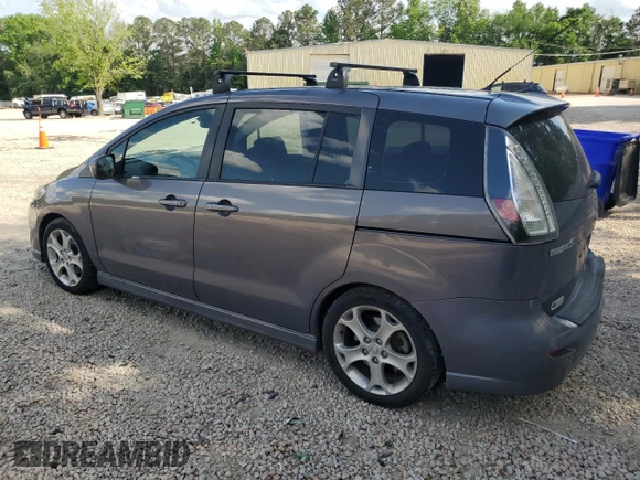2010 Mazda 5 Sport z VIN JM1CR2W34A0386374, wystawiony jako Copart lot #54013095 z przebiegiem 76 871 mil mil oraz Szkoda całkowita • Salvage title. Historia ofert i sprzedaży dostępna na DreamBid. Obrazek 2.