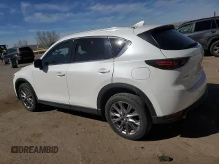 2019 Mazda CX-5 Grand Touring with VIN JM3KFADM4K1674408, listed as a Copart auction lot 47684015 with 77,554 mi miles and Salvage Title. Bid and sale history available at carsss.com. Image 2.