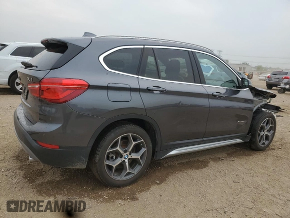 2017 BMW X1 xDrive28i with VIN WBXHT3Z3XH4A53999, listed as a Copart auction lot 60500265 with 43,377 mi miles and Salvage title. Bid and sale history available at DreamBid. Image 3.
