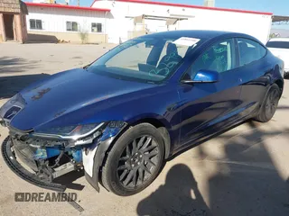 2024 Tesla Model 3 Long Range with VIN 5YJ3E1EB2RF758998, listed as a IAAI auction lot 41861108 with 14,531 mi miles and . Bid and sale history available at DreamBid. Image 18.