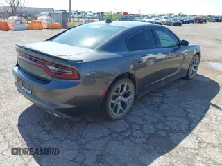 2015 Dodge Charger SXT with VIN 2C3CDXHG9FH825135, listed as a IAAI auction lot 42172793 with 169,324 mi miles and . Bid and sale history available at DreamBid. Image 4.