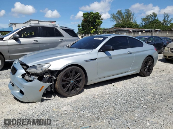 2013 BMW 6 Series 650i with VIN WBAYM9C59DDW20408, listed as a Copart auction lot 73585214 with 143,605 mi miles and Clean Title. Bid and sale history available at carsss.com. Image 1.