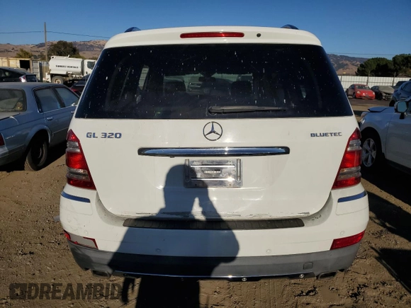 2009 Mercedes-Benz GL-Class 3.0L BlueTEC with VIN 4JGBF25E09A491857, listed as a Copart auction lot 77693274 with 224,797 mi miles and Salvage Title. Bid and sale history available at carsss.com. Image 6.