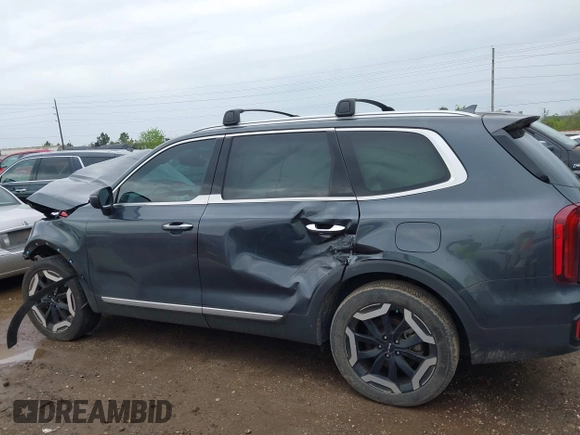 2023 Kia Telluride S with VIN 5XYP6DGC7PG339945, listed as a IAAI auction lot 41903398 with 25,072 mi miles and . Bid and sale history available at DreamBid. Image 14.
