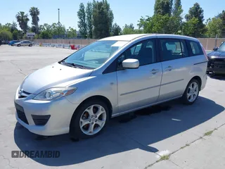 2009 Mazda 5 Touring z VIN JM1CR29L090334702, wystawiony jako IAAI lot #42349375 z przebiegiem 188 173 mil mil oraz . Historia ofert i sprzedaży dostępna na DreamBid. Obrazek 2.
