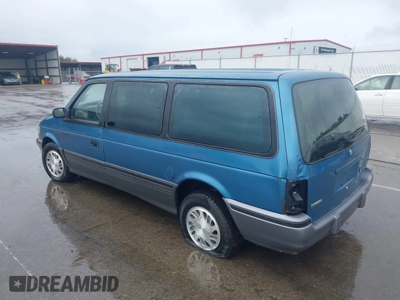 1992 Dodge Grand Caravan z VIN 1B4GH54R6NX218758, wystawiony jako IAAI lot #42362782 z przebiegiem 172 142 mil mil oraz . Historia ofert i sprzedaży dostępna na DreamBid. Obrazek 3.
