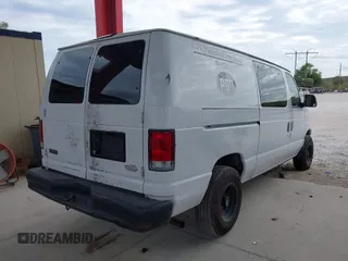 2001 Ford Econoline Cargo with VIN 1FTRE14261HA22632, listed as a IAAI auction lot 41202164 with 153,412 mi miles and . Bid and sale history available at DreamBid. Image 4.