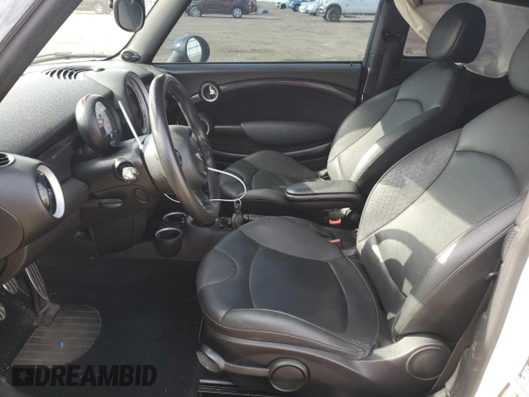 2013 MINI Hardtop S with VIN WMWSV3C54DT478670, listed as a Copart auction lot 52710445 with 58,974 mi miles and Salvage title. Bid and sale history available at DreamBid. Image 7.