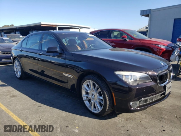 2011 BMW 7 Series 750Li with VIN WBAKB8C52BCY66628, listed as a Copart auction lot 77191054 with 39,503 mi miles and Salvage title. Bid and sale history available at DreamBid. Image 4.