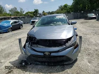 2024 Toyota Corolla LE with VIN 5YFB4MDE4RP099838, listed as a Copart auction lot 50309795 with 10,481 mi miles and Salvage Title. Bid and sale history available at carsss.com. Image 11.