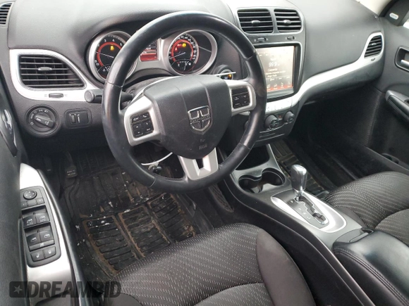2013 Dodge Journey Crew with VIN 3C4PDCCG4DT698618, listed as a Copart auction lot 87632875 with 198,284 mi miles and Salvage title. Bid and sale history available at DreamBid. Image 8.