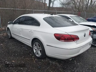 2014 Volkswagen CC Sport with VIN WVWBN7AN4EE505014, listed as a IAAI auction lot 41520345 with 140,422 mi miles and . Bid and sale history available at DreamBid. Image 3.