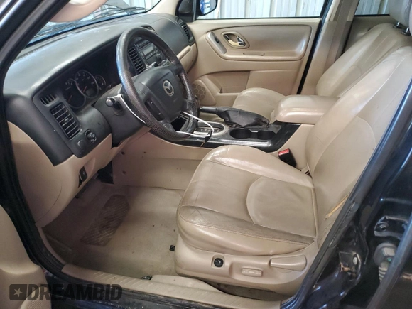 2005 Mazda Tribute S with VIN 4F2CZ06175KM24743, listed as a Copart auction lot 52815395 with 197,148 mi miles and Salvage Title. Bid and sale history available at carsss.com. Image 7.