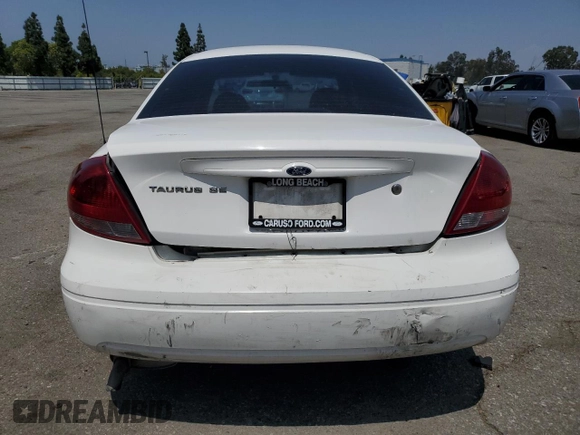 2006 Ford Taurus SE with VIN 1FAFP53U96A104173, listed as a Copart auction lot 59624865 with 145,005 mi miles and Salvage title. Bid and sale history available at DreamBid. Image 6.