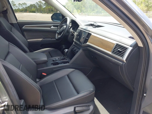 2021 Volkswagen Atlas SE with VIN 1V2HR2CA9MC585740, listed as a IAAI auction lot 42279757 with 64,995 mi miles and . Bid and sale history available at DreamBid. Image 5.