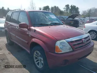 2004 Suzuki XL-7 LX with VIN JS3TX92V044105157, listed as a IAAI auction lot 42036497 with 244,104 mi miles. Bid and sale history available at carsss.com. Image 1.
