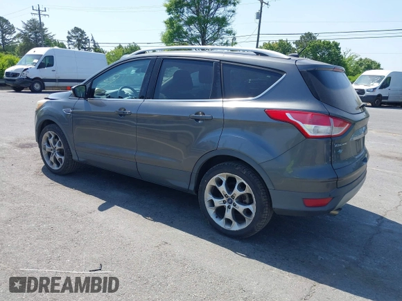 2015 Ford Escape Titanium with VIN 1FMCU0J94FUB24350, listed as a IAAI auction lot 42065641 with 168,215 mi miles. Bid and sale history available at carsss.com. Image 3.