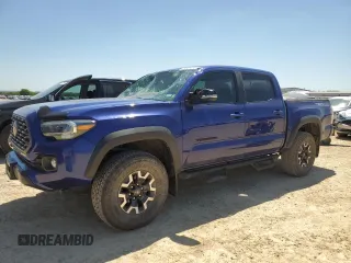 2023 Toyota Tacoma SR z VIN 3TMCZ5AN1PM634435, wystawiony jako Copart lot #51971215 z przebiegiem 32 874 mil mil oraz Czysty tytuł • Clean title. Historia ofert i sprzedaży dostępna na DreamBid. Obrazek 1.