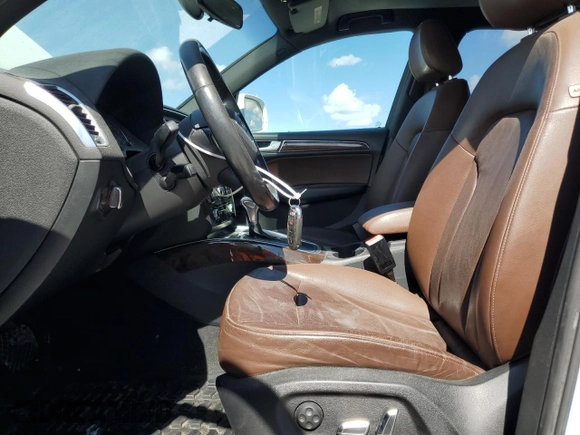 2014 Audi Q5 Premium z VIN WA1CFAFP2EA014791, wystawiony jako Copart lot #61251745 z przebiegiem 157 043 mil mil oraz Czysty tytuł • Clean title. Historia ofert i sprzedaży dostępna na DreamBid. Obrazek 7.