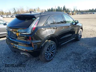 2024 Cadillac XT4 AWD Sport with VIN 1GYFZFR44RF198384, listed as a IAAI auction lot 41691257 with 5,400 mi miles and . Bid and sale history available at DreamBid. Image 4.