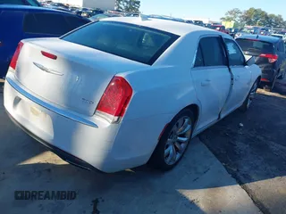 2016 Chrysler 300 Anniversary Edition with VIN 2C3CCAAG6GH343881, listed as a IAAI auction lot 41593752 with 135,719 mi miles and . Bid and sale history available at DreamBid. Image 4.