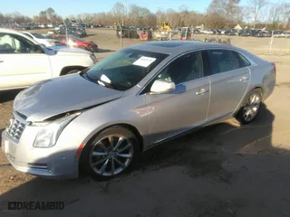 2014 Cadillac XTS Luxury with VIN 2G61M5S30E9187222, listed as a IAAI auction lot 41842676 with 113,594 mi miles. Bid and sale history available at carsss.com. Image 17.