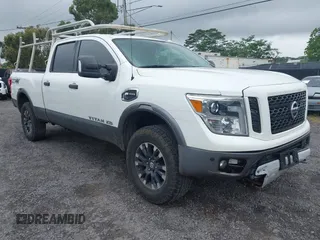 2017 Nissan Titan XD PRO-4X with VIN 1N6BA1F47HN517135, listed as a IAAI auction lot 41605323 with 108,984 mi miles. Bid and sale history available at carsss.com. Image 1.