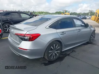 2023 Honda Civic EX z VIN 2HGFE1F79PH303727, wystawiony jako IAAI lot #42251695 z przebiegiem 21 071 mil mil oraz . Historia ofert i sprzedaży dostępna na DreamBid. Obrazek 4.