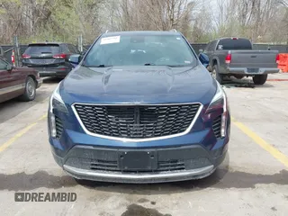 2021 Cadillac XT4 AWD Premium Luxury z VIN 1GYFZDR45MF048569, wystawiony jako IAAI lot #41902941 z przebiegiem 53 891 mil mil oraz . Historia ofert i sprzedaży dostępna na DreamBid. Obrazek 12.