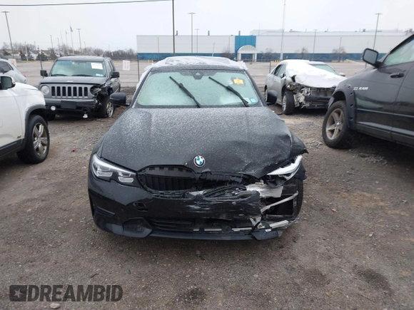 2020 BMW 3 Series 330i xDrive with VIN WBA5R7C08LFH44012, listed as a IAAI auction lot 41252675 with 57,486 mi miles. Bid and sale history available at carsss.com. Image 11.