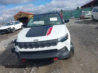 2022 Jeep Compass Trailhawk z VIN 3C4NJDDB7NT226018, wystawiony jako IAAI lot #40929794 z przebiegiem 25 702 mil mil oraz . Historia ofert i sprzedaży dostępna na DreamBid. Obrazek 12.