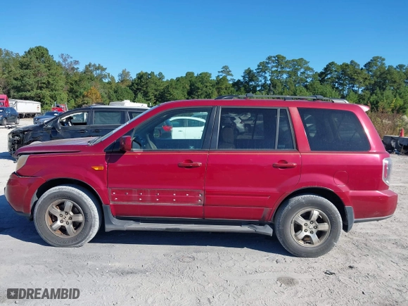 2006 Honda Pilot EX-L with VIN 5FNYF18566B022909, listed as a IAAI auction lot 40576412 with 310,278 mi miles. Bid and sale history available at carsss.com. Image 14.