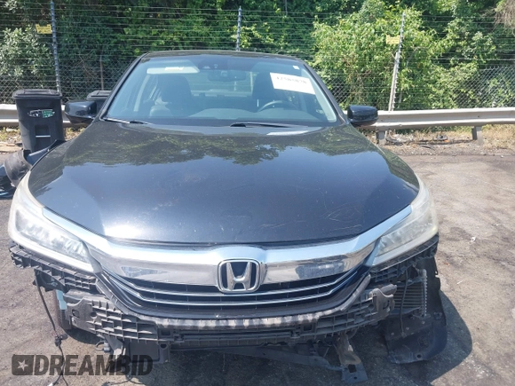2017 Honda Accord Touring with VIN JHMCR6F74HC005706, listed as a IAAI auction lot 42585878 with 158,388 mi miles and . Bid and sale history available at DreamBid. Image 13.